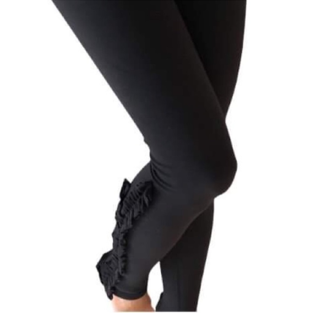 Lululemon Athletica Black Leggings with Ruffle Detail.
